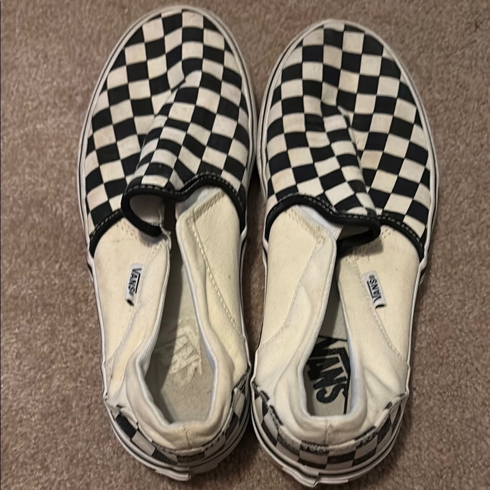 Vans Black and White Checkerboard Slip-On Sneakers